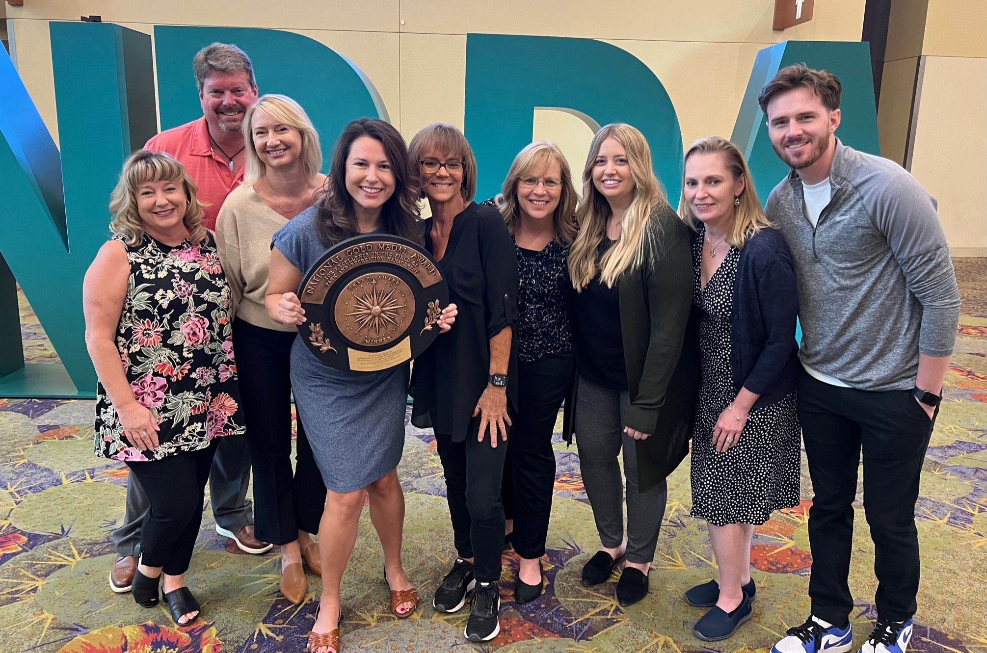 Department leaders celebrating the recognition as one of the top programs in the country,